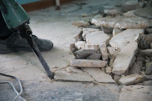 Cement Slab Removal in Brick