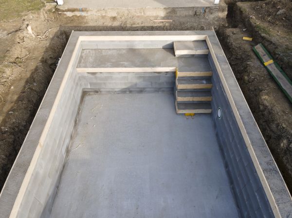 Concrete Pool Demolition in Brick